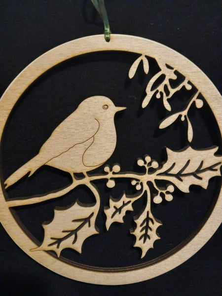 Wooden hanging of a Robin amongst Holly and Mistletoe