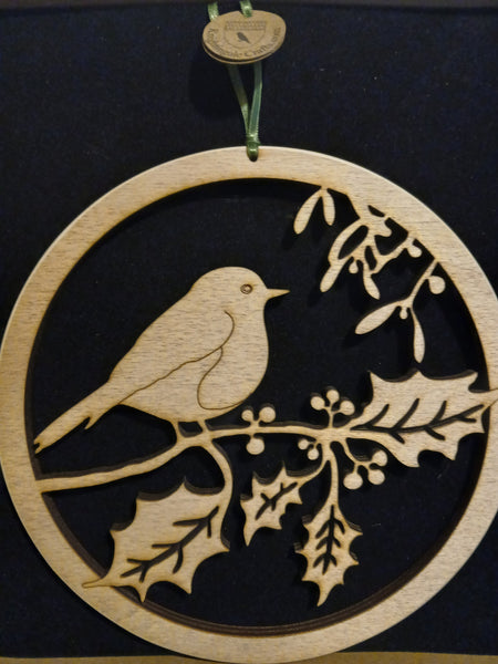 Wooden hanging of a Robin amongst Holly and Mistletoe