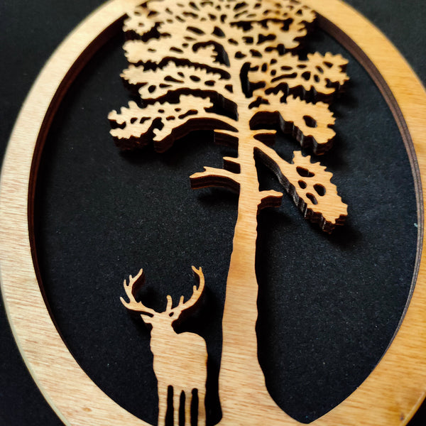 Wooden Hanging of a Stag under Scots Pine Tree